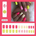 Detail of neon yellow and pink press-on nails in short square shape with wavy patterns - Dual Color Jump (W1054)