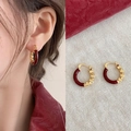 Detail of vintage dark red enamel heart earrings with gold-tone finish on model - Gold Red Ear Hoop with 925 Sterling Silver Earring Post