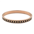 Détail du bracelet en acier inoxydable or rose avec émail noir et motifs à pois dorés - Noir Rose
