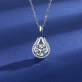 Silver teardrop necklace featuring a large white round center stone with accent diamonds - Xl-39 [with Cross Chain]