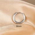 Detailed macro shot of 8mm silver polished stainless steel hoop earring on silk - 1PC / 8mm / Silver