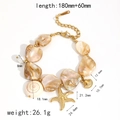 Bracciale in acciaio inossidabile dorato con ciondoli a stella marina, conchiglie e perle - Bracciale a Catena con Stella Marina e Conchiglia (TB5107)