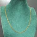 3mm minimalist gold stainless steel chain necklace displayed on a green velvet bust - Width 3MM Length 50cm / Gold