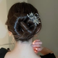 Elegant silver swan hair pin with clear crystals styled in a classic bun for women - Gun Black Crystal Swan Design Style (103#)