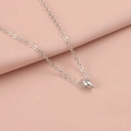 Detailed close-up of a silver starfish and seashell pendant on a delicate chain necklace - Silver Color 6#