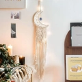 Detail of moon-shaped macrame wall hanging with evil eye bead and LED string lights - Moon Large Eye Style A