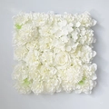 Close-up of white artificial rose and hydrangea floral wall panel for wedding decor - White
