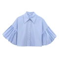 Detail of light blue puff sleeve shirt with button-down front and pointed collar - Lavender
