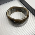 Detailed view of wide resin bangle with brown marble texture and amber gradient finish - Style D Brown Marble Texture