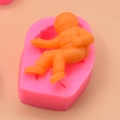 Pink astronaut silicone mold for fondant cakes and chocolate with finished orange figure - Sitting Astronaut Style (5)