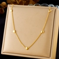 Gold plated stainless steel chain necklace featuring five 3D heart charms on a soft cushion - Gold Five Hearts Necklace (N3232)
