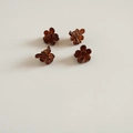 Set of four mini tortoise shell flower hair claws with a vintage amber translucent finish - Coffee