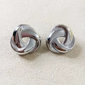 Polished silver stainless steel triple interlinked knot stud earrings in geometric design - Silver