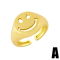 Anello dorato regolabile con faccina sorridente, occhio a stella e design traforato - Stile Viso Sorridente Cavo / Oro
