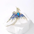 Exquisite gold phoenix brooch with blue enamel wings and a large navy blue gemstone - Blue Gemstone Phoenix