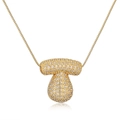 Golden mushroom pendant necklace with sparkling crystals on a clean white background - Letter T