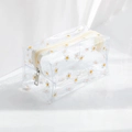 Transparente PVC-Kosmetiktasche mit Gänseblümchen-Druck und beigem Reißverschluss - Kleine weiße Blume / 18x9x9.5cm