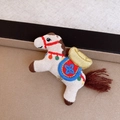 Detail of vintage style embroidered horse brooch with golden sycee and red blue patterns - 53# Brooch - White - Ingot