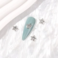 Ciondoli per nail art a stella in lega d'argento con strass su unghie azzurre - Argento Zirconia Trasparente