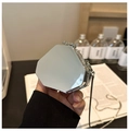 Close-up of a silver mirror-finish octagonal mini evening bag with a sleek metal chain strap - Polygon / Silver