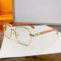 Gafas rectangulares de metal dorado con patillas de madera clara y textura de veta - Montura Dorada Lente Transparente