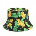 Detail of banana and palm leaf print on black reversible bucket hat fabric texture - Banana Leaf Black