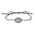 Detailed close-up of Evil Eye beaded bracelet with silver beads and multicolored crystals - Silver (Multicolor)