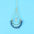 Detail of crescent moon pendant with blue stones and rainbow crystal prism drop - Lapis Lazuli