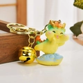 Cute yellow cartoon dragon keychain with a gold bell and a metallic ring accessory - Flying Dragon Style