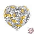 S925 sterling silver heart charm with golden leaf accents and sparkling crystals - BSC672 Hollow Leaf Heart