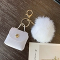 Mini white faux leather bag keychain with fluffy faux fur pompom and gold hardware - Lizard Pattern / White