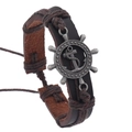 Detail showing multi-layer brown leather braid with silver anchor and rudder charms - 16-Brown Leather Anchor Helm Style