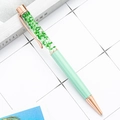 Mint green DIY herbarium ballpoint pen with rose gold accents and dried green flowers - Macaron Green