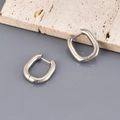 Minimalist silver-tone U-shaped stainless steel hoop earrings with a polished finish - Silver