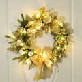 Golden Christmas wreath with LED lights, pine needles, and silk flowers on a white door - With Lights / Golden Christmas Wreath