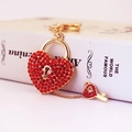 Golden heart-shaped padlock and key keychain set with red rhinestones and chain - Red