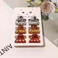 Detail of 6-piece mini hair claw clips in tortoiseshell and marble patterns on display card - Speckled Watermelon