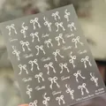 Witte strik nagelstickers M1266 met parelmoerglans en elegante beauty tekst - Witte Gaas Parel Strikken (M-1266)