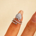 Close-up of a gold-plated heart-shaped fingernail ring with shimmering pavé zircon stones - Spiral Pave Heart Nail Ring (4789)