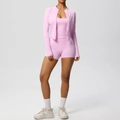 Three-piece pink yoga set featuring a zip-up jacket, sports bra, and high-waist shorts - Sakura Pink