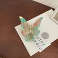 Iridescent butterfly hair claw clip with colorful gradient finish and gold metal spring - Light Pink Green