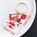 Detailansicht von Lippen, Rose und Herz Anhängern mit Maßen 7,0cm und 3,0cm - Emaille Roter Lippenstift Herz Rose Stil (ER882)