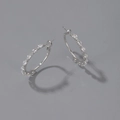 Silver hoop earrings featuring marquise-cut sparkling cubic zirconia with a needle closure - White K (2943) / Silver