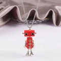 Hip hop red movable robot necklace with silver Eiffel Tower base feet on white background - Red