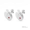 Macro shot of silver stainless steel teardrop earrings with central red zircon stones - Teardrop (599-04B) / Teardrop Earrings (Red Rhinestone - Steel Color)