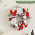 40cm Christmas wreath with red bows, white poinsettia, and snowy pine needles - Red White Flower Wreath 40cm
