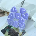 Set di 9 candele profumate viola a forma di cuore in una confezione regalo trasparente - Set da 9 Pezzi / Viola