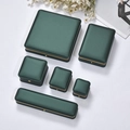 Dark green jewelry gift box set with gold trim for rings and necklaces on white background - Dark Green