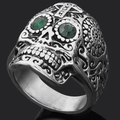 Vintage silver Viking skull ring with green gemstone eyes and intricate floral carvings - US 8 / Steel
