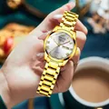 Women's gold quartz watch with double calendar display and sleek metal link bracelet - Roman All Gold White Dial Women's
